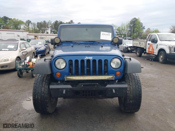 2010 Jeep Wrangler Unlimited Sport with VIN 1J4BA3H11AL144560, listed as a IAAI auction lot 42013032 with 226,233 mi miles. Bid and sale history available at carsss.com. Image 12.