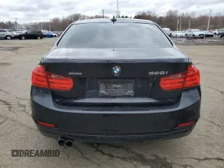 2013 BMW 3 Series 328i xDrive with VIN WBA3B3C51DJ976382, listed as a Copart auction lot 52262085 with 110,432 mi miles and Salvage title. Bid and sale history available at DreamBid. Image 6.