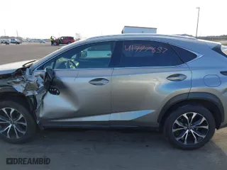 2015 Lexus NX 200t with VIN JTJBARBZ2F2002932, listed as a IAAI auction lot 41797857 with 205,902 mi miles. Bid and sale history available at carsss.com. Image 14.