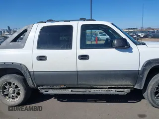 2003 Chevrolet Avalanche with VIN 3GNEK13TX3G263258, listed as a IAAI auction lot 41861349 with 200,892 mi miles. Bid and sale history available at carsss.com. Image 13.