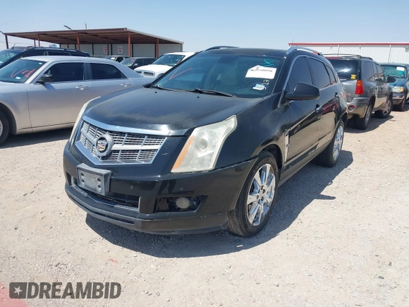 2011 Cadillac SRX Performance Collection z VIN 3GYFNBEYXBS543464, wystawiony jako IAAI lot #42350098 z przebiegiem 146 747 mil mil oraz . Historia ofert i sprzedaży dostępna na DreamBid. Obrazek 2.