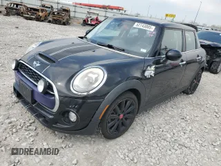 2016 MINI Hardtop 4 Door S z VIN WMWXU3C51G2B67610, wystawiony jako Copart lot #52743005 z przebiegiem 160 434 mil mil oraz Szkody całkowita. Historia ofert i sprzedaży dostępna na DreamBid. Obrazek 1.