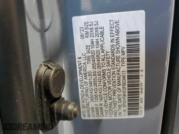 2023 Honda Passport Elite with VIN 5FNYF8H03PB034613, listed as a Copart auction lot 54009215 with 102,841 mi miles and Salvage title. Bid and sale history available at DreamBid. Image 13.