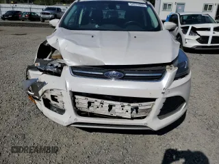 2016 Ford Escape Titanium with VIN 1FMCU9JX5GUC44579, listed as a Copart auction lot 54974965 with 113,776 mi miles and Salvage Title. Bid and sale history available at DreamBid. Image 12.