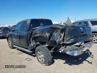 2005 Nissan Titan XE with VIN 1N6BA06A15N560400, listed as a IAAI auction lot 41656560 with 212,568 mi miles. Bid and sale history available at carsss.com. Image 14.