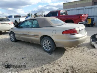 2004 Chrysler Sebring Limited z VIN 1C3EL65R14N257513, wystawiony jako Copart lot #84049844 z przebiegiem 82 402 mil mil oraz Szkoda całkowita • Salvage title. Historia ofert i sprzedaży dostępna na DreamBid. Obrazek 2.