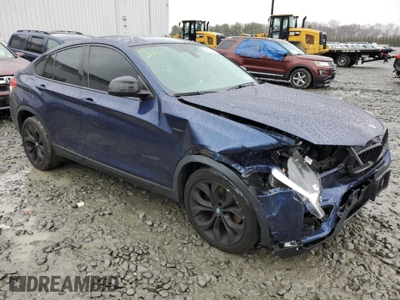 2015 BMW X4 xDrive35i with VIN 5UXXW5C50F0E88829, listed as a Copart auction lot 69464872 with 44,057 mi miles. Bid and sale history available at carsss.com. Image 4.