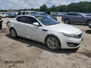 2013 Kia Optima EX z VIN 5XXGN4A72DG237404, wystawiony jako Copart lot #61293445 z przebiegiem 166 327 mil mil oraz Czysty tytuł • Clean title. Historia ofert i sprzedaży dostępna na DreamBid. Obrazek 4.