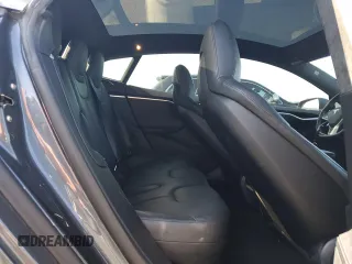 2017 Tesla Model S 100D с VIN 5YJSA1E2XHF185516, выставлен на аукционе Copart как лот 61816135 с пробегом 132 267 миль миль и Списание • Salvage title. История ставок и продаж доступна на DreamBid. Изображение 10.