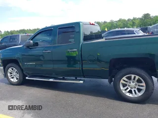2014 Chevrolet Silverado 1500 LT with VIN 1GCRCREH2EZ323115, listed as a IAAI auction lot 42055949 with 61,337 mi miles and . Bid and sale history available at DreamBid. Image 14.