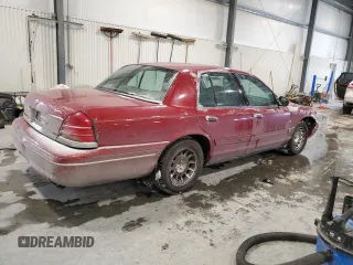 2001 Ford Crown Victoria LX z VIN 2FAFP74W21X206992, wystawiony jako Copart lot #45082985 z przebiegiem 137 954 mil mil oraz Szkoda całkowita • Salvage title. Historia ofert i sprzedaży dostępna na DreamBid. Obrazek 3.