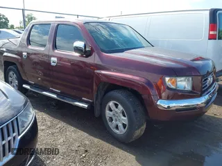 2007 Honda Ridgeline RTL with VIN 2HJYK16587H518901, listed as a IAAI auction lot 42762425 with 206,243 mi miles and . Bid and sale history available at DreamBid. Image 1.