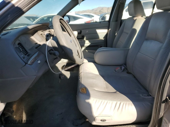 2005 Ford Crown Victoria LX with VIN 2FAFP74W75X165930, listed as a Copart auction lot 81641294 with 138,521 mi miles and Clean Title. Bid and sale history available at carsss.com. Image 7.