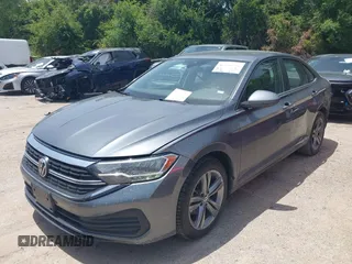 2024 Volkswagen Jetta SE with VIN 3VWEM7BU9RM047828, listed as a IAAI auction lot 42760196 with 21,311 mi miles and . Bid and sale history available at DreamBid. Image 2.