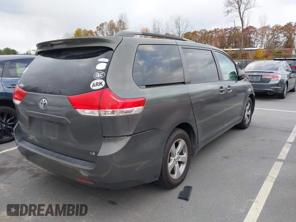 2012 Toyota Sienna LE AAS with VIN 5TDKK3DC5CS253020, listed as a IAAI auction lot 40900034 with 208,421 mi miles. Bid and sale history available at carsss.com. Image 4.