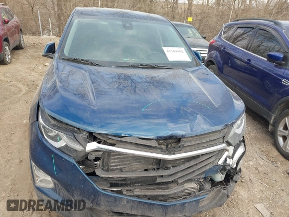 2020 Chevrolet Equinox LT z VIN 2GNAXKEV3L6109751, wystawiony jako IAAI lot #41709902 z przebiegiem 129 468 mil mil oraz . Historia ofert i sprzedaży dostępna na DreamBid. Obrazek 12.