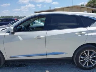 2019 Acura RDX Technology with VIN 5J8TC1H53KL007506, listed as a IAAI auction lot 42158315 with 123,323 mi miles and . Bid and sale history available at DreamBid. Image 14.