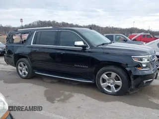 2019 Chevrolet Suburban Premier with VIN 1GNSKJKC7KR261826, listed as a IAAI auction lot 41652451 with 127,032 mi miles and . Bid and sale history available at DreamBid. Image 13.