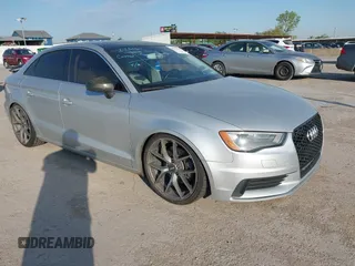 2015 Audi A3 Premium z VIN WAUACGFF5F1015240, wystawiony jako IAAI lot #42032916 z przebiegiem 129 656 mil mil oraz . Historia ofert i sprzedaży dostępna na DreamBid. Obrazek 1.