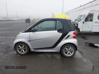 2015 Smart fortwo Passion with VIN WMEEJ3BA9FK819985, listed as a IAAI auction lot 41879486 with 79,394 mi miles. Bid and sale history available at carsss.com. Image 14.