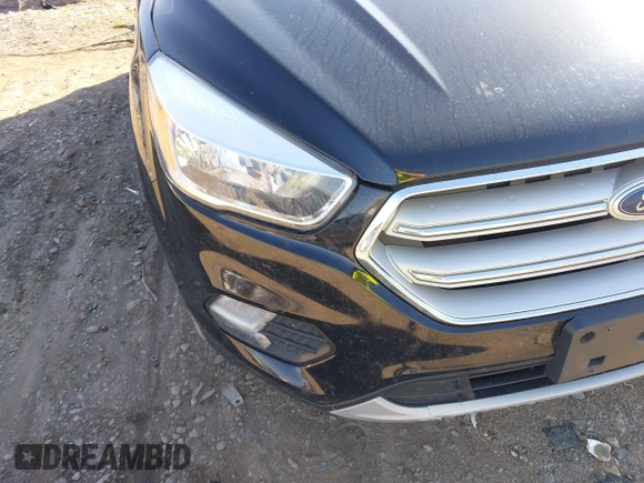 2018 Ford Escape SE z VIN 1FMCU9GD5JUB15259, wystawiony jako IAAI lot #42182040 z przebiegiem 122 194 mil mil oraz . Historia ofert i sprzedaży dostępna na DreamBid. Obrazek 19.