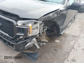 2019 Ford F-150 XL with VIN 1FTEW1CP7KKD80786, listed as a IAAI auction lot 41117065 with 142,011 mi miles and . Bid and sale history available at DreamBid. Image 6.