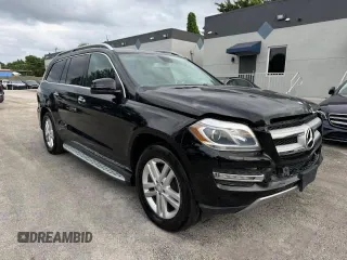 2016 Mercedes-Benz GL with VIN 4JGDF6EE1GA625384, listed as a Copart auction lot 77045634 with 104,938 mi miles and Salvage Title. Bid and sale history available at carsss.com. Image 4.