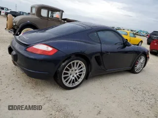 2006 Porsche Cayman S с VIN WP0AB29836U781164, выставлен на аукционе Copart как лот 74904904 с пробегом 130 705 миль миль и Списание • Salvage title. История ставок и продаж доступна на DreamBid. Изображение 3.