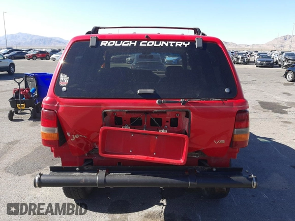 1996 Jeep Grand Cherokee Limited with VIN 1J4GZ78Y0TC376265, listed as a Copart auction lot 52124345 with 205,676 mi miles and Salvage Title. Bid and sale history available at carsss.com. Image 6.