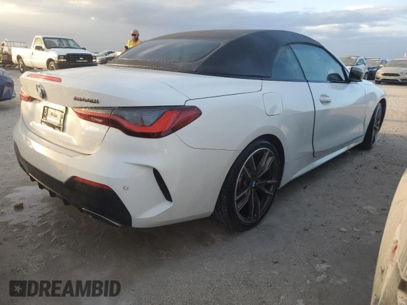 2022 BMW 4 Series M440i with VIN WBA53AT06NCK03623, listed as a Copart auction lot 76490964 with Not provided miles and Salvage title. Bid and sale history available at DreamBid. Image 3.