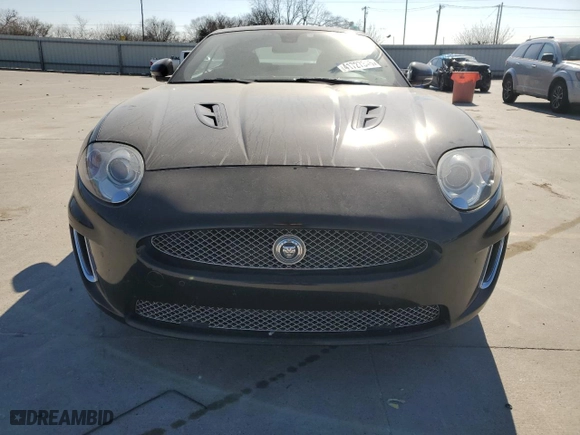 2010 Jaguar XK with VIN SAJWA4DC3AMB35569, listed as a Copart auction lot 41727345 with 124,270 mi miles and Salvage Title. Bid and sale history available at carsss.com. Image 5.