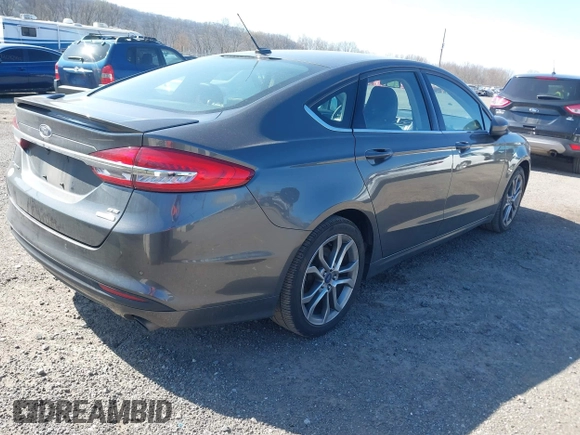 2017 Ford Fusion SE z VIN 3FA6P0HD8HR211638, wystawiony jako IAAI lot #42029399 z przebiegiem 90 262 mil mil oraz . Historia ofert i sprzedaży dostępna na DreamBid. Obrazek 4.