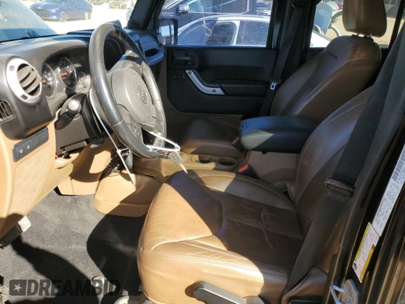 2014 Jeep Wrangler Unlimited Rubicon X with VIN 1C4HJWFG8EL119654, listed as a Copart auction lot 46699055 with 148,412 mi miles and Salvage title. Bid and sale history available at DreamBid. Image 7.