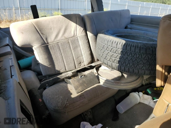 1989 Ford Bronco with VIN 1FMCU14T0KUA33910, listed as a Copart auction lot 57730195 with 53,335 mi miles and Salvage title. Bid and sale history available at DreamBid. Image 11.