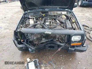 1999 Jeep Cherokee Sport with VIN 1J4FT68S6XL598558, listed as a IAAI auction lot 41549504 with 238,004 mi miles. Bid and sale history available at carsss.com. Image 10.