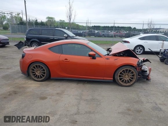 2014 Scion FR-S z VIN JF1ZNAA16E9703911, wystawiony jako IAAI lot #42079578 z przebiegiem 95 754 mil mil oraz . Historia ofert i sprzedaży dostępna na DreamBid. Obrazek 13.