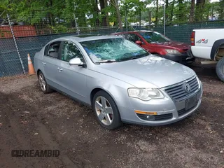 2009 Volkswagen Passat Komfort with VIN WVWJK73C09P055842, listed as a IAAI auction lot 42231559 with 216,514 mi miles and . Bid and sale history available at DreamBid. Image 1.