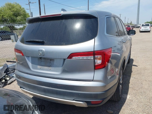 2020 Honda Pilot EX-L z VIN 5FNYF5H52LB007696, wystawiony jako IAAI lot #42065587 z przebiegiem 74 781 mil mil oraz . Historia ofert i sprzedaży dostępna na DreamBid. Obrazek 4.