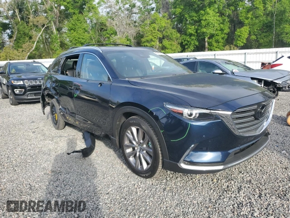 2021 Mazda CX-9 Carbon Edition with VIN JM3TCBDY3M0541637, listed as a Copart auction lot 49209115 with 90,363 mi miles and Salvage title. Bid and sale history available at DreamBid. Image 4.