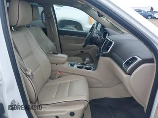 2017 Jeep Grand Cherokee Overland with VIN 1C4RJFCG6HC941771, listed as a IAAI auction lot 42356577 with 192,318 mi miles and . Bid and sale history available at DreamBid. Image 5.