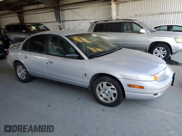 2000 Saturn SL with VIN 1G8ZK5275YZ269895, listed as a Copart auction lot 63102485 with Not provided miles and Clean title. Bid and sale history available at DreamBid. Image 4.