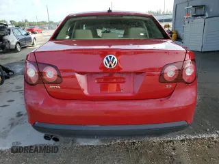 2009 Volkswagen Jetta SE z VIN 3VWRM71K49M150351, wystawiony jako Copart lot #63278195 z przebiegiem 157 248 mil mil oraz Szkoda całkowita • Salvage title. Historia ofert i sprzedaży dostępna na DreamBid. Obrazek 6.