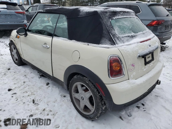 2010 MINI Convertible with VIN WMWMR3C50ATU97287, listed as a Copart auction lot 89116615 with 120,323 mi miles and Salvage Title. Bid and sale history available at DreamBid. Image 2.