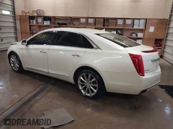 2013 Cadillac XTS Luxury with VIN 2G61R5S37D9152726, listed as a IAAI auction lot 41718331 with 88,189 mi miles and . Bid and sale history available at DreamBid. Image 3.