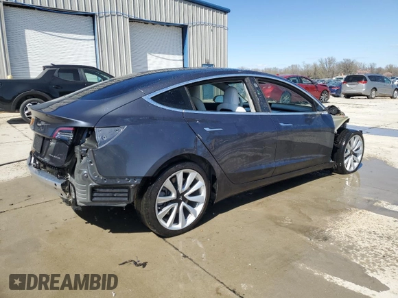 2020 Tesla Model 3 Long Range with VIN 5YJ3E1EBXLF668795, listed as a Copart auction lot 49913515 with 82,962 mi miles and Salvage Title. Bid and sale history available at DreamBid. Image 3.