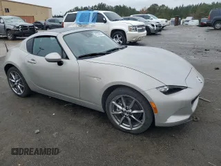 2022 Mazda MX-5 Miata Grand Touring z VIN JM1NDAM78N0504942, wystawiony jako Copart lot #83746334 z przebiegiem 17 610 mil mil oraz Szkoda całkowita • Salvage title. Historia ofert i sprzedaży dostępna na DreamBid. Obrazek 4.