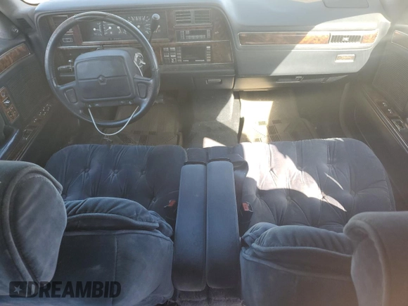 1990 Chrysler New Yorker z VIN 1C3XY66R4LD784183, wystawiony jako Copart lot #75364784 z przebiegiem 114 456 mil mil oraz Tytuł czysty. Historia ofert i sprzedaży dostępna na DreamBid. Obrazek 8.