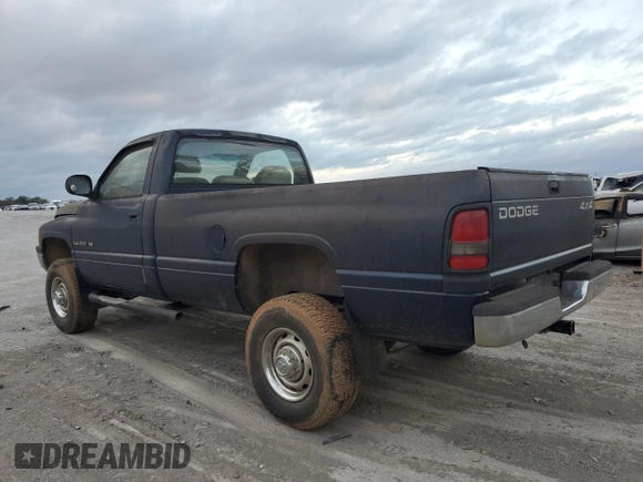 2001 Dodge 2500 z VIN 3B7KF26Z51M560104, wystawiony jako Copart lot #79052294 z przebiegiem Nie podano mil oraz Czysty tytuł • Clean title. Historia ofert i sprzedaży dostępna na DreamBid. Obrazek 2.
