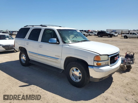 2001 GMC Yukon SLT z VIN 1GKEC13T81J152049, wystawiony jako Copart lot #56494675 z przebiegiem 160 102 mil mil oraz Szkoda całkowita • Salvage title. Historia ofert i sprzedaży dostępna na DreamBid. Obrazek 4.