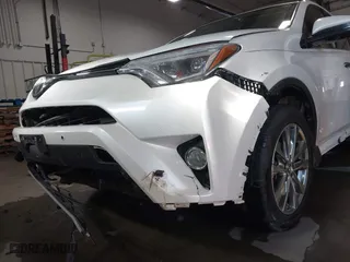 2018 Toyota RAV4 Limited with VIN JTMDFREV8JD235765, listed as a IAAI auction lot 41312430 with 205,732 mi miles. Bid and sale history available at carsss.com. Image 6.